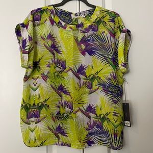 Jennifer Lopez green blouse